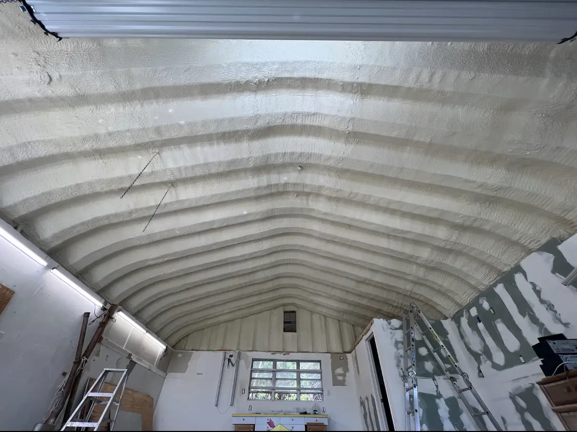 Spray polyurethane foam applied to the underside of a metal roof deck in Lansdowne